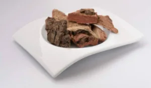 How to Make Mauby Drink: Recipe, Flavour Variations and What the Research Says 3 Pieces of dried mauby bark in a white dish
